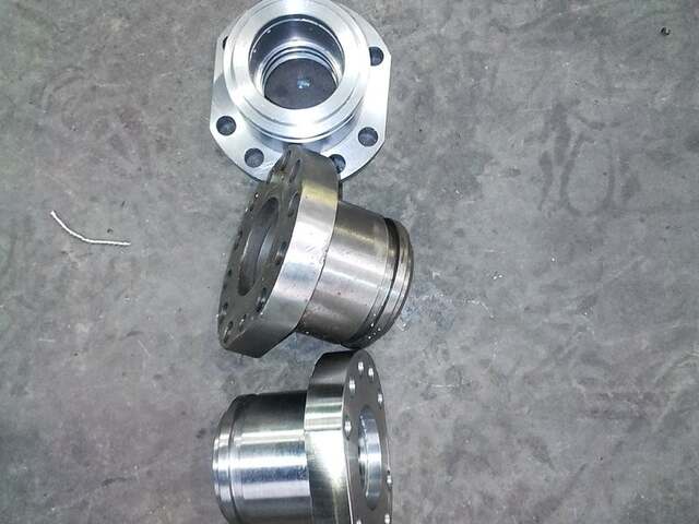 Machined hub / flange housings